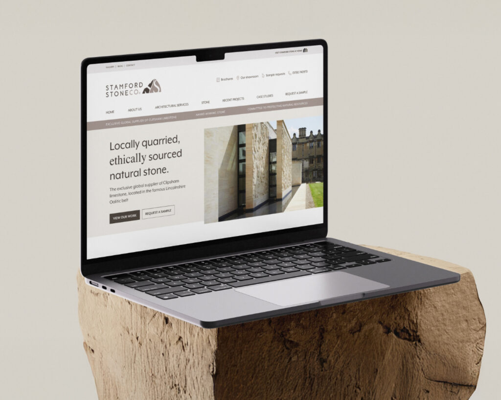 Laptop showing natural stone company website design