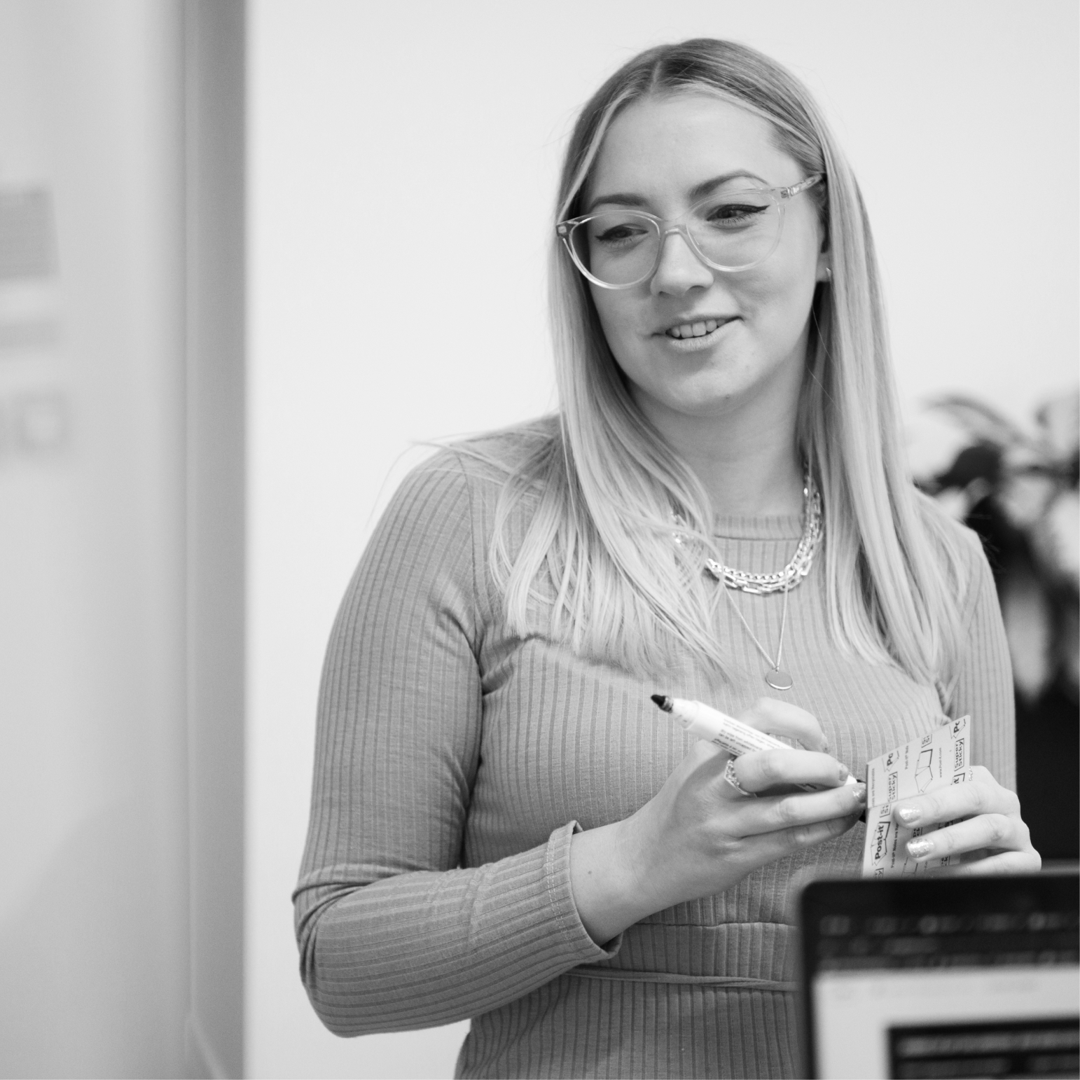 Team member presenting brand ideas during strategy meeting