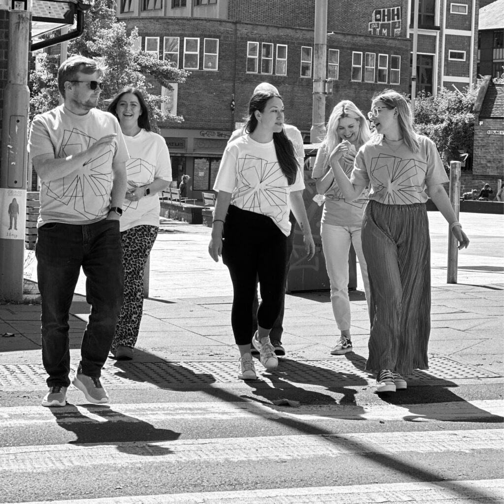 Team outside the office chatting
