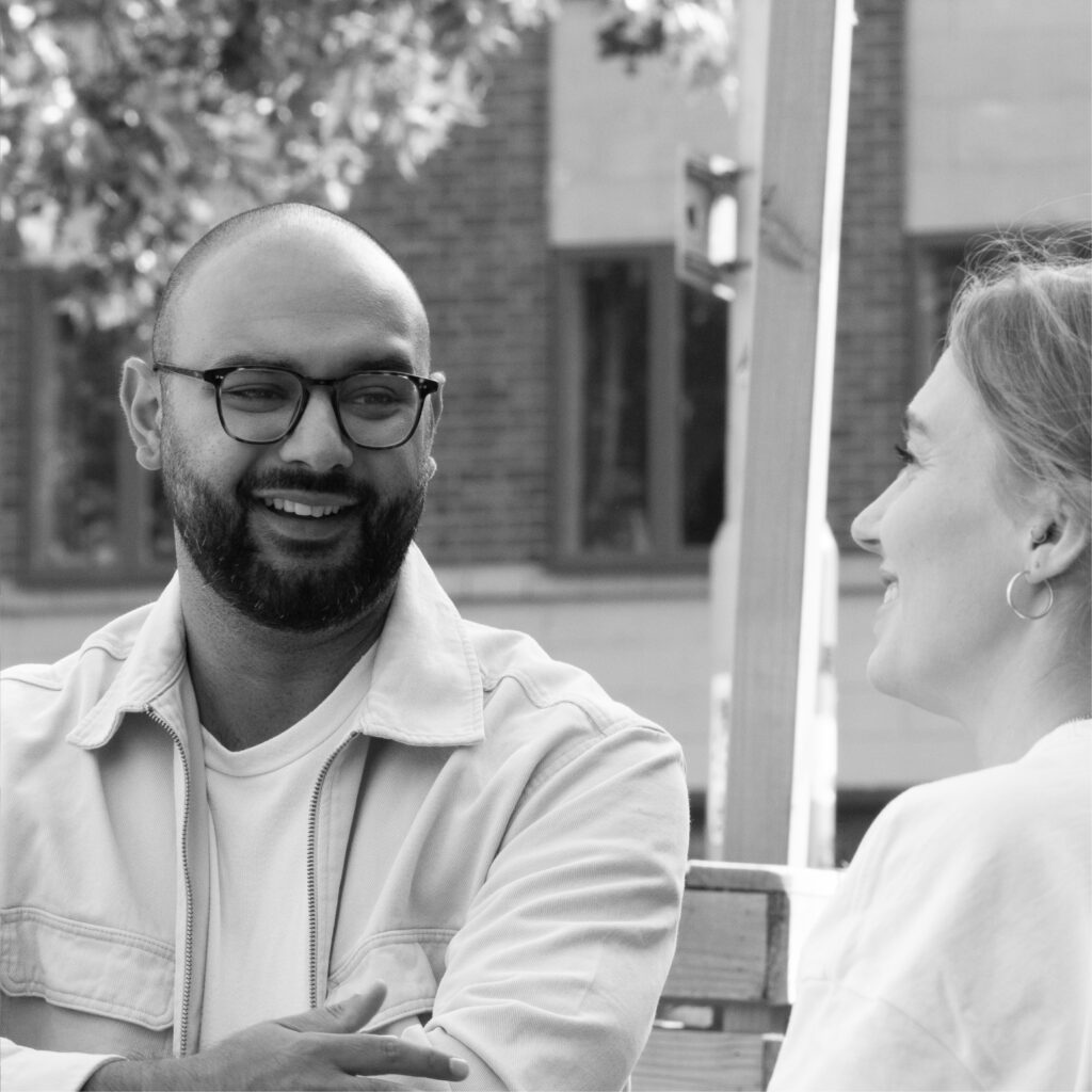 Brand managers chatting and smiling