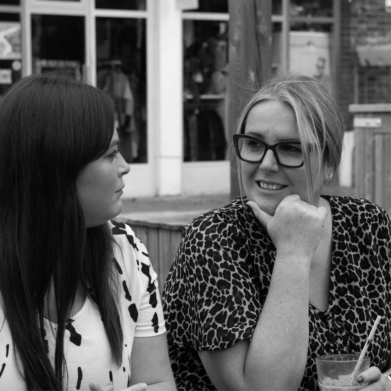 Photoshoot of our marketing team, Michelle, Sarah and Ellie strategising 