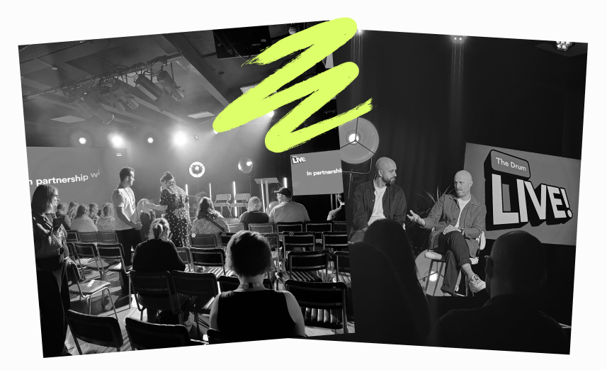 Audience sitting at conference and panel discussion stage